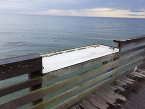 venice fishing pier cleaning table